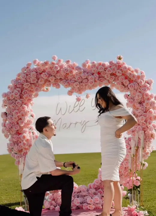 Pink floral proposal setup by Big Moments Co.