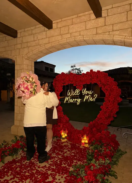 Red rose proposal setup by Big Moments Co.