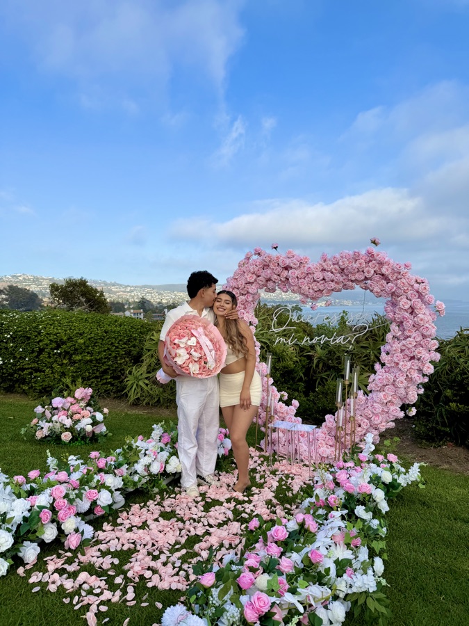 Pink floral heart arch proposal by Big Moments Co.
